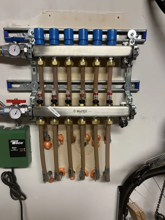 Plumber performing Leak Detection at a residential property in Coon Rapids